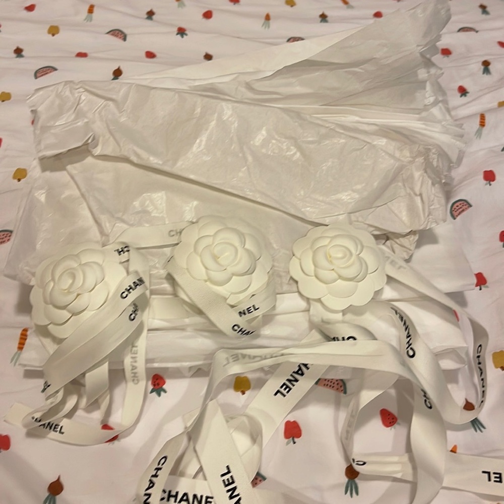 Chanel flowers and ribbons.